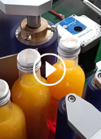 Automatic vertical round bottle positioning and labeling machine (food and beverage)